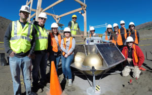 Iolani Students pose with their mock spacecraft at a planetary analog test site on Hawaii Island.