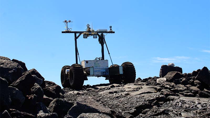 planetary rover on lava terrain