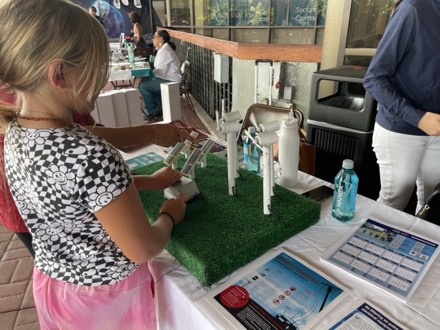 Sustainable energy demo at Onizuka Day exhibit hall.